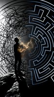 Man silhouette standing before glowing circular maze with cosmic energy burst, representing problem solving, mental challenges and breakthrough moments.
