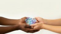 Diverse hands gently holding colorful geometric crystal together symbolizing unity, teamwork, collaboration and shared goals in multicultural partnership.