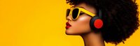 Young African American woman with natural afro hairstyle wearing red headphones and yellow sunglasses against vibrant yellow background, profile view with bright red lipstick.
