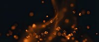 Glowing golden particles and sparks burst upward against dark background, creating dynamic light effects for motion graphics, visual effects, and multimedia projects.