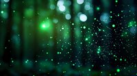Abstract green bokeh lights with sparkling particles on dark background for festive celebrations, digital art projects and magical atmosphere designs.