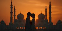 Romantic couple silhouette against mosque at sunset with golden sky. Islamic architecture backdrop creates intimate moment for wedding and travel concepts.