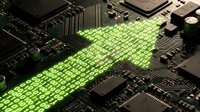Green digital data stream flowing across computer motherboard with microchips and electronic components representing cybersecurity and information technology concepts.