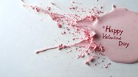 Pink paint splash with Happy Valentine's Day text on white background, artistic romantic splatter effect creates dynamic movement and festive mood.