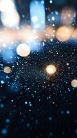 Abstract cosmic space background with glowing particles and bokeh lights creating starburst effect for digital art and science fiction designs.