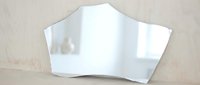 Blank white curved paper mockup on wooden surface, isolated and ready for branding, packaging design, and marketing presentations.