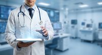 Male doctor in white coat using digital tablet with holographic medical data display in modern hospital setting for healthcare technology applications.