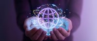 Businessman hands holding glowing digital globe with network connections and data points representing global business technology and worldwide connectivity.