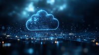 Glowing digital cloud symbol floating over night city skyline with network connections and light particles, representing cloud computing technology.