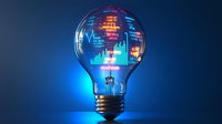 Glowing light bulb with financial charts and stock market data projected inside on blue background, representing business innovation and market analysis.