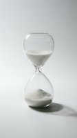 Hourglass with flowing white sand on neutral background, symbolizing passage of time, deadline, and urgency for business and productivity concepts.