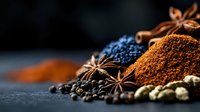 Aromatic spices and seasonings collection with star anise, black peppercorns, and ground spices on dark background, macro food photography for cooking concepts.