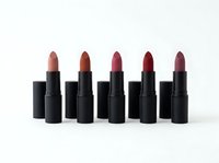 Five lipsticks in nude to deep berry shades with black cases arranged in row on white background for beauty and cosmetics marketing.