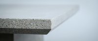 Modern concrete architectural detail with clean geometric lines against white background for contemporary design projects.