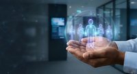 Businessman hands holding holographic team icons in modern office representing human resources management and digital workforce solutions.