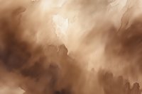 Dramatic brown and beige clouds with sunlight breaking through create moody atmospheric background for spiritual, religious, or nature-themed designs.
