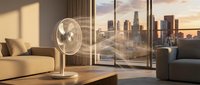 Modern electric fan on a table in a stylish living room with city skyline at sunset, airflow lines visible, warm golden light.