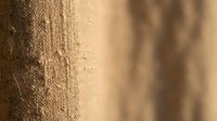 Natural burlap fabric texture with rough woven fibers and organic hemp material surface for rustic design projects and craft backgrounds.