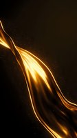 Golden light waves flowing dynamically across dark background with glowing particles, suitable for technology, energy, and abstract design projects.