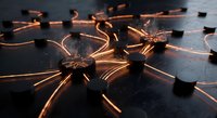 Abstract network connections with glowing copper pathways linking nodes on dark surface for technology and communication concepts.