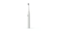Modern electric toothbrush with sleek white design isolated on white background, ready for dental care product marketing and healthcare design projects.