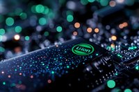 Close-up of lithium-ion battery with glowing bokeh lights and water droplets. Green energy technology concept for electric vehicles and renewable power.