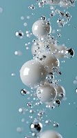 White spheres and silver bubbles floating in water against turquoise background, creating elegant motion effect for cosmetic or spa advertising.