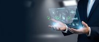 Businessman holding glowing digital tablet with cybersecurity lock icons, data protection interface, network safety concept for technology and business use.