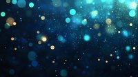 Magical glowing blue and gold bokeh lights scattered on dark background with sparkling particles and dreamy atmosphere. Festive holiday backdrop for design projects.