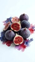 Fresh purple figs with red flesh on watercolor splash background, healthy organic fruit for culinary and wellness content.