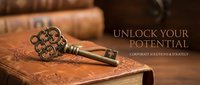 Vintage ornate key resting on old leather-bound books with motivational text about unlocking potential for business and personal development concepts.