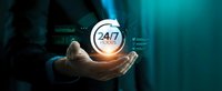 Professional businessman holding glowing 24/7 service icon with digital technology background for customer support and business solutions.