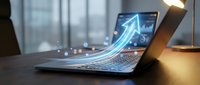 Business growth concept with glowing arrow emerging from laptop screen showing upward trend analytics on modern office desk with warm lighting.