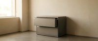 Modern minimalist chest of drawers in contemporary bedroom interior with natural lighting and neutral color palette for home decor projects.