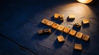 Wooden letter blocks spelling "approved" arranged on dark textured surface with warm lighting, suitable for business, success, and decision-making concepts.