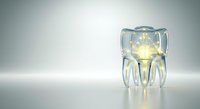 Transparent glass tooth with glowing golden light inside, isolated on white background, suitable for dental clinic branding, healthcare marketing, and tooth care product packaging.