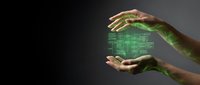 Hands protecting glowing green digital circuit board hologram representing cybersecurity, data protection and technology innovation concepts.