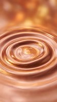 Concentric swirling liquid ripples in warm copper and gold tones create an abstract vortex effect, suitable for backgrounds and design projects.