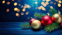 Festive Christmas ornaments with red and gold baubles on pine branches against blue background with bokeh lights.