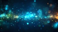 Magical glowing particles and bokeh lights creating cosmic atmosphere on dark background with blue and golden sparkles floating in space.