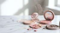 Rose gold makeup collection with blush powder compacts and brushes on marble surface in soft natural lighting for beauty and cosmetics branding.