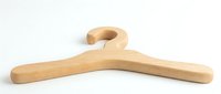 Wooden clothes hanger with smooth natural finish on white background, isolated for wardrobe organization, home decor, and retail clothing display concepts.