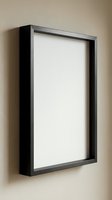 Modern black picture frame with white mat mounted on beige wall, empty space for artwork or photo display, contemporary home decor and interior design element.