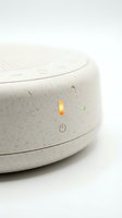 Ceramic essential oil diffuser with illuminated power button and indicator lights, isolated on white background for product design and aromatherapy marketing.