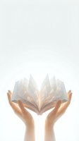 Open hands holding glowing book with pages transforming into light rays symbolizing knowledge, education and learning on white background.
