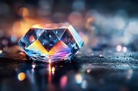 Sparkling diamond crystal with rainbow reflections on dark surface creating luxury jewelry and precious gemstone concept with colorful bokeh lights background.