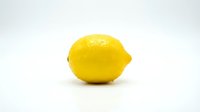 Fresh yellow lemon fruit isolated on white background for healthy cooking, citrus recipes, natural vitamin C supplement and organic food design.