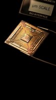 Advanced microprocessor chip with golden circuits on laboratory measurement device showcasing cutting-edge semiconductor technology and precision engineering.