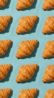 Freshly baked croissants arranged in repeating rows on light turquoise background, creating seamless pattern for bakery, cafe, food and beverage design projects.