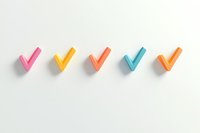 Colorful checkmark symbols in pink, yellow, coral, turquoise and orange arranged in row on white background. Minimal design elements for business concepts.